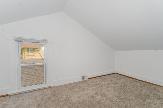 528 E Benton St, Aurora, IL 60505 - additional living space featuring lofted ceiling and carpet floors