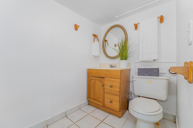 528 E Benton St, Aurora, IL 60505 - half bath featuring vanity and tile patterned floors