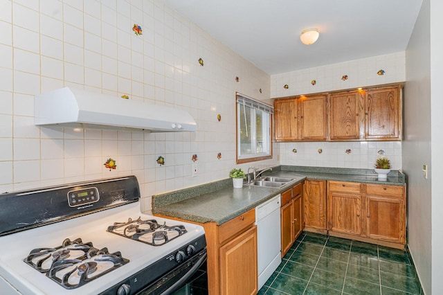 528 E Benton St, Aurora, IL 60505 - kitchen featuring white appliances, under cabinet range hood, decorative backsplash, brown cabinetry, and dark countertops