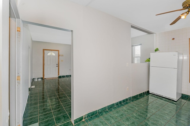 528 E Benton St, Aurora, IL 60505 - corridor featuring dark tile patterned floors