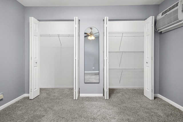 5701 W 129th St Unit 2B, Crestwood, IL 60418 - unfurnished bedroom with carpet floors, multiple closets, and a wall unit AC