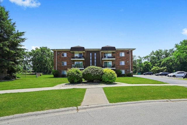 5701 W 129th St Unit 2B, Crestwood, IL 60418 - view of building exterior with uncovered parking