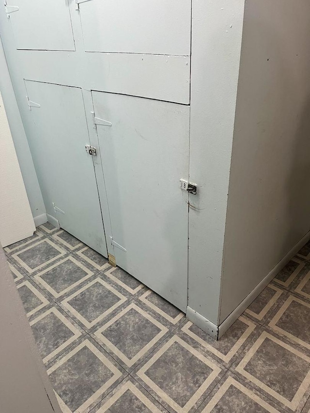 5701 W 129th St Unit 2B, Crestwood, IL 60418 - detailed view of tile patterned floors and baseboards