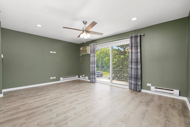 5701 W 129th St Unit 2B, Crestwood, IL 60418 - unfurnished room featuring a baseboard heating unit, a ceiling fan, a wall mounted air conditioner, wood finished floors, and recessed lighting