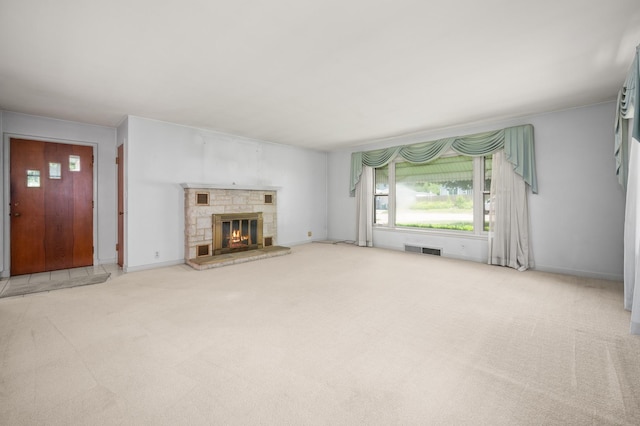 115 Fair St, Sycamore, IL 60178 - unfurnished living room with carpet flooring and a stone fireplace