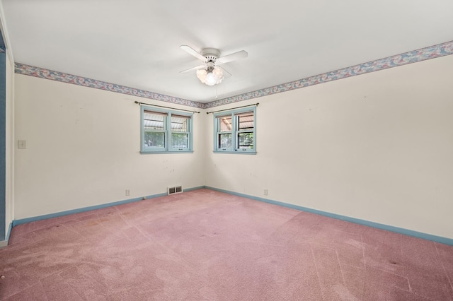115 Fair St, Sycamore, IL 60178 - carpeted spare room with ceiling fan and baseboards