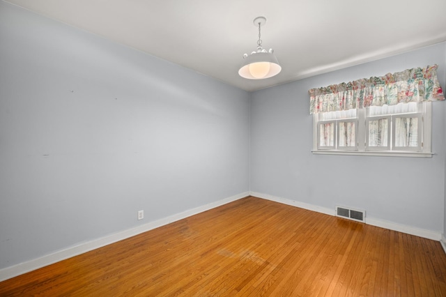 115 Fair St, Sycamore, IL 60178 - empty room with baseboards and light wood-type flooring