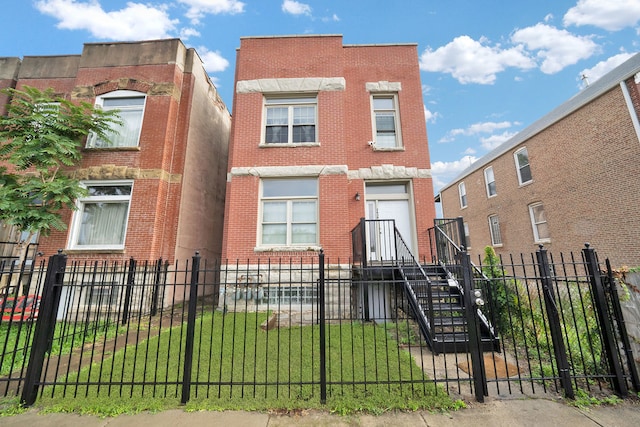 2638 W Adams St, Chicago, IL 60612 - view of front of property with a fenced front yard and brick siding