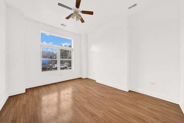 2638 W Adams St, Chicago, IL 60612 - spare room with wood finished floors and ceiling fan