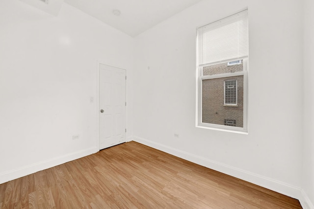 2638 W Adams St, Chicago, IL 60612 - unfurnished room with baseboards and light wood-type flooring