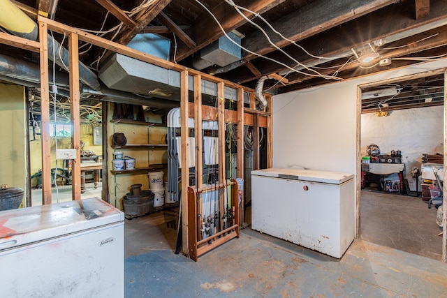 4116 E 13th Rd, Earlville, IL 60518 - unfinished below grade area with white refrigerator