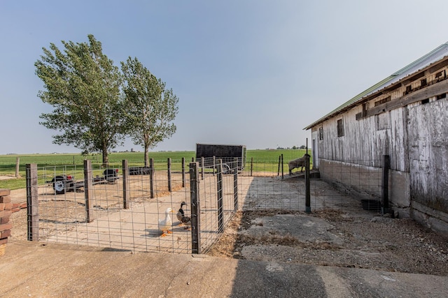 4116 E 13th Rd, Earlville, IL 60518 - exterior space featuring a view of countryside and an outbuilding