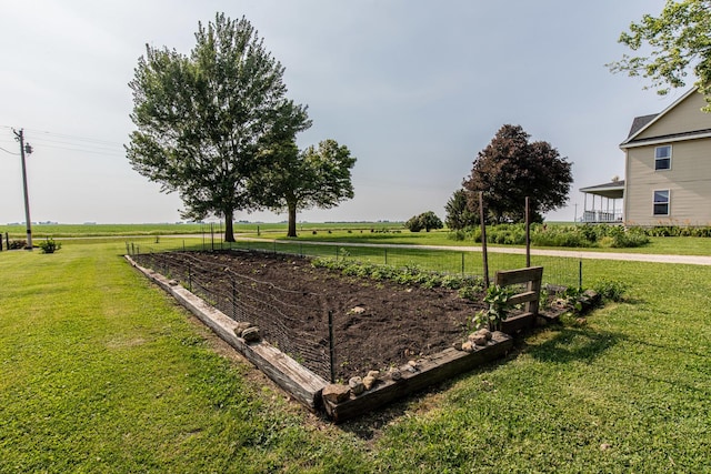4116 E 13th Rd, Earlville, IL 60518 - view of home's community with a vegetable garden, a yard, and a view of rural / pastoral area
