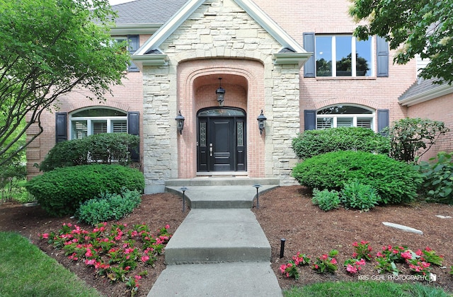 2520 Hanford Ln, Aurora, IL 60502 - doorway to property featuring stone siding and brick siding