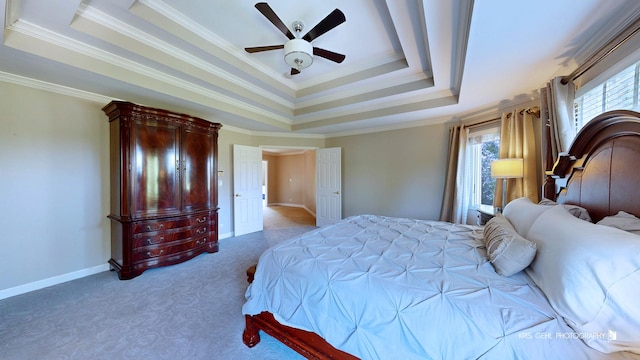 2520 Hanford Ln, Aurora, IL 60502 - bedroom featuring a raised ceiling, multiple windows, carpet, crown molding, and ceiling fan
