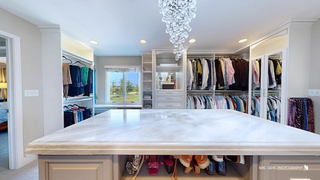 2520 Hanford Ln, Aurora, IL 60502 - walk in closet with a chandelier and carpet floors