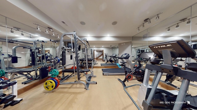 2520 Hanford Ln, Aurora, IL 60502 - workout area featuring wood finished floors and track lighting