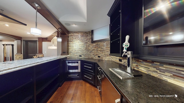 2520 Hanford Ln, Aurora, IL 60502 - bar featuring oven, decorative backsplash, dark wood-type flooring, decorative light fixtures, and recessed lighting