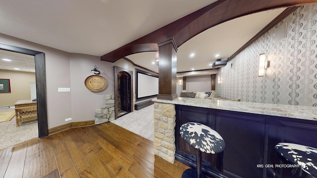 2520 Hanford Ln, Aurora, IL 60502 - cinema room with wood-type flooring, recessed lighting, bar area, and decorative columns