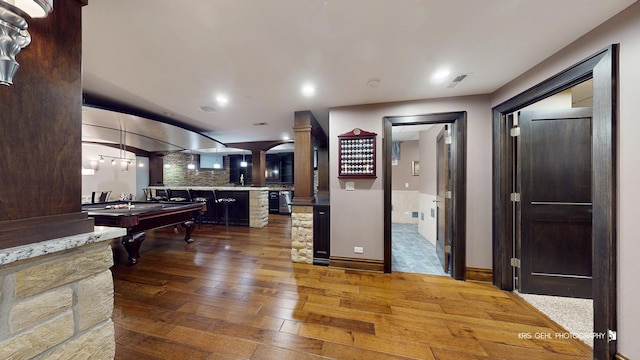 2520 Hanford Ln, Aurora, IL 60502 - kitchen featuring wood-type flooring, billiards table, tasteful backsplash, recessed lighting, and light countertops