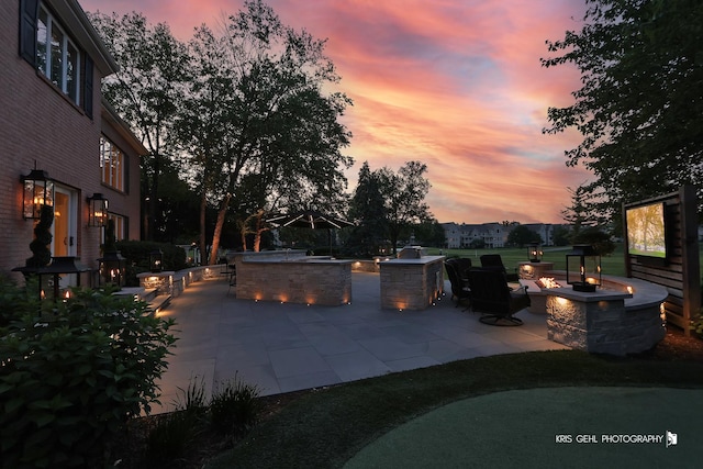 2520 Hanford Ln, Aurora, IL 60502 - view of patio / terrace with an outdoor fire pit and an outdoor kitchen