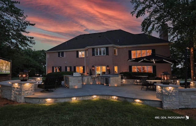 2520 Hanford Ln, Aurora, IL 60502 - back of house featuring a fire pit, area for grilling, a patio, and a yard