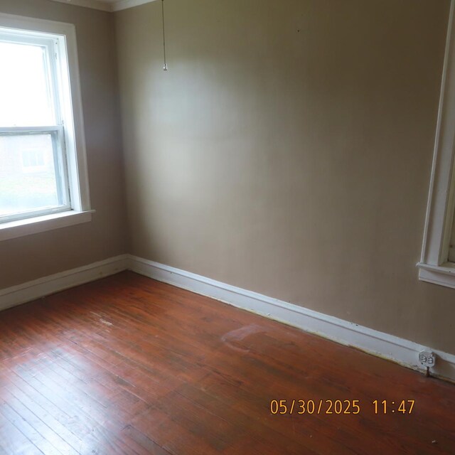 7741 S Indiana Ave, Chicago, IL 60619 - unfurnished room featuring hardwood / wood-style flooring and baseboards