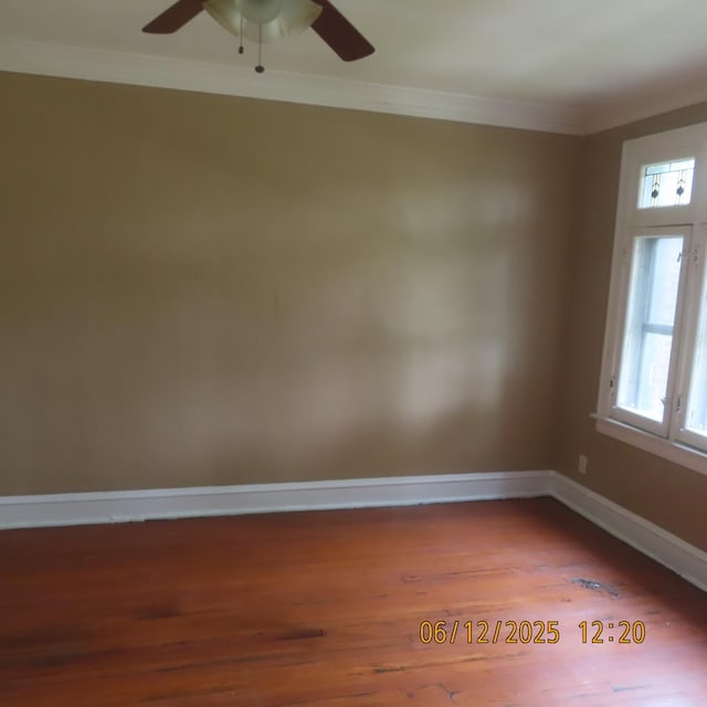 7741 S Indiana Ave, Chicago, IL 60619 - spare room with plenty of natural light, ceiling fan, wood finished floors, and crown molding