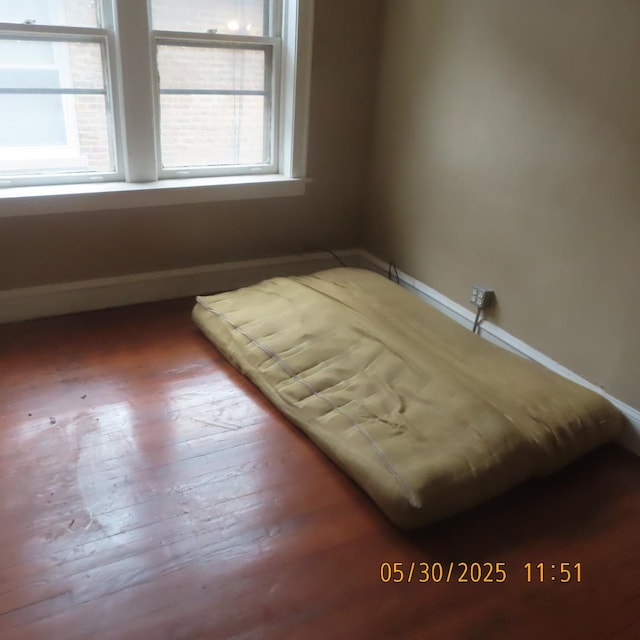 7741 S Indiana Ave, Chicago, IL 60619 - bedroom featuring multiple windows and hardwood / wood-style flooring