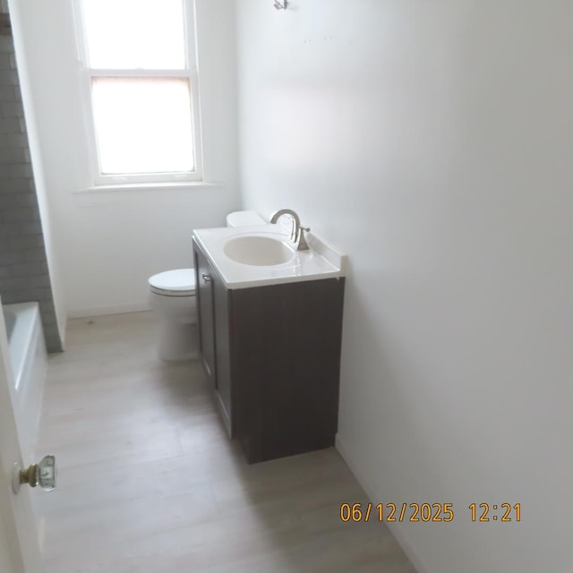 7741 S Indiana Ave, Chicago, IL 60619 - full bathroom with vanity and toilet