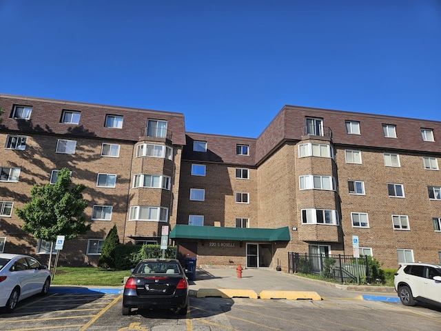 220 S Roselle Rd Unit 324, Schaumburg, IL 60193 - view of apartment building / complex featuring uncovered parking