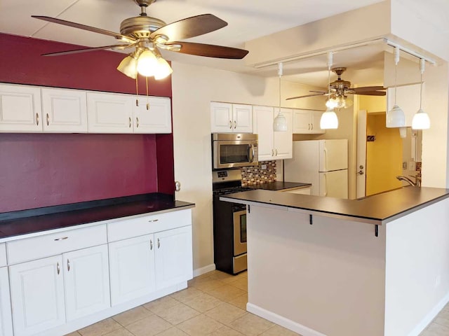 220 S Roselle Rd Unit 324, Schaumburg, IL 60193 - kitchen featuring appliances with stainless steel finishes, ceiling fan, dark countertops, backsplash, and white cabinets