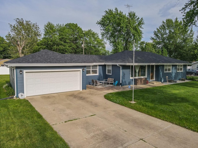 620 Edwin Dr, Bourbonnais, IL 60914 - ranch-style house featuring a front lawn, driveway, an attached garage, and roof with shingles