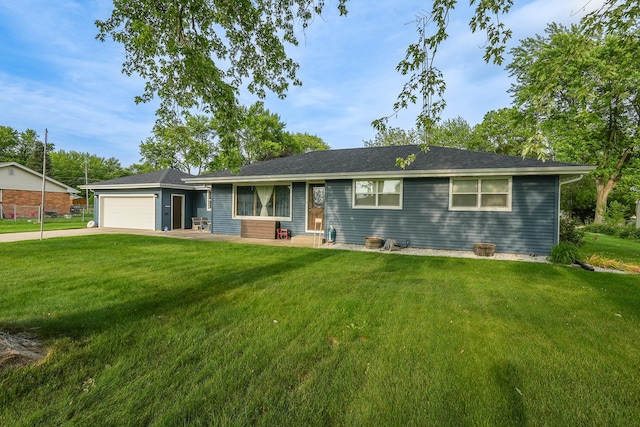 620 Edwin Dr, Bourbonnais, IL 60914 - view of front of house featuring entry steps, a front lawn, concrete driveway, and a garage