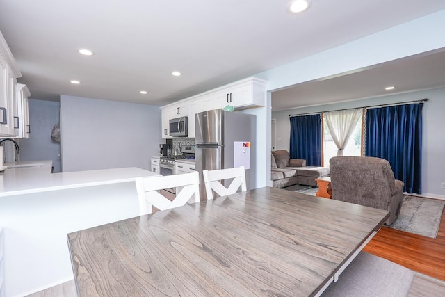 620 Edwin Dr, Bourbonnais, IL 60914 - dining room with light wood-style floors and recessed lighting