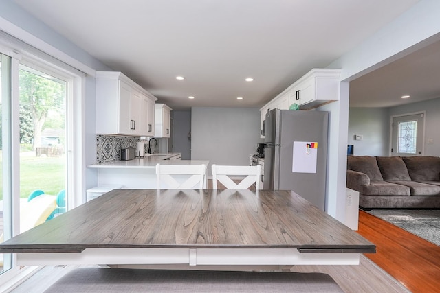 620 Edwin Dr, Bourbonnais, IL 60914 - dining space with wood finished floors and recessed lighting