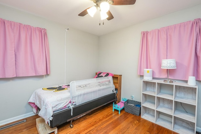 620 Edwin Dr, Bourbonnais, IL 60914 - bedroom with wood finished floors and a ceiling fan