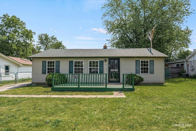 812 S Sumner Ave, Aurora, IL 60505 - ranch-style home with a wooden deck and a chimney