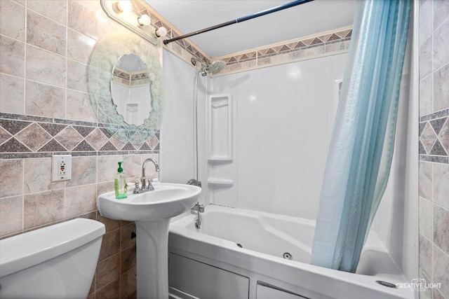 812 S Sumner Ave, Aurora, IL 60505 - full bathroom with a combined bath / shower with jetted tub and tile walls
