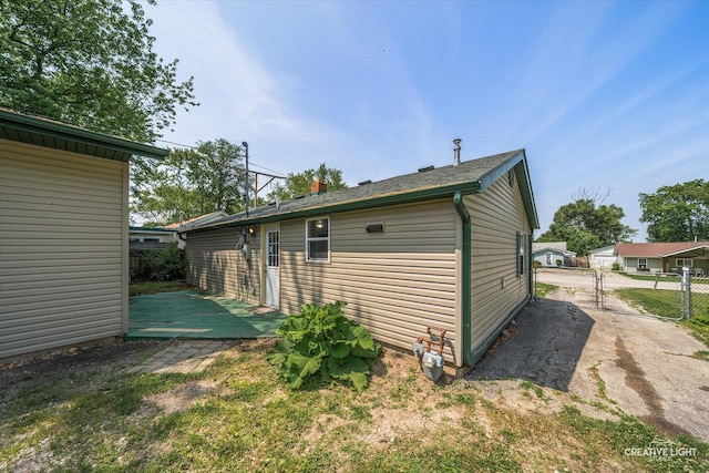 812 S Sumner Ave, Aurora, IL 60505 - rear view of house featuring a wooden deck and a gate