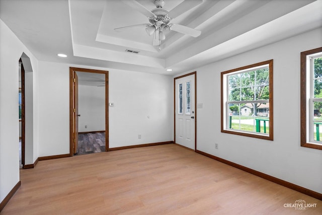 812 S Sumner Ave, Aurora, IL 60505 - empty room featuring light wood-style floors, a raised ceiling, recessed lighting, and ceiling fan