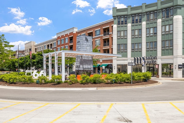 1000 Village Center Dr Unit 103, Burr Ridge, IL 60527 - view of property featuring uncovered parking