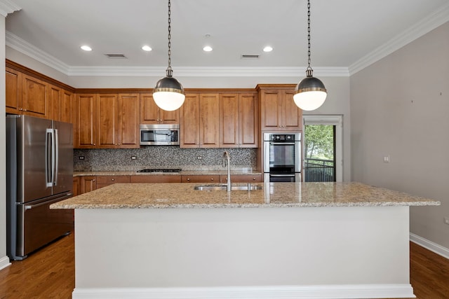 1000 Village Center Dr Unit 103, Burr Ridge, IL 60527 - kitchen featuring stainless steel appliances, ornamental molding, backsplash, dark wood-type flooring, and an island with sink
