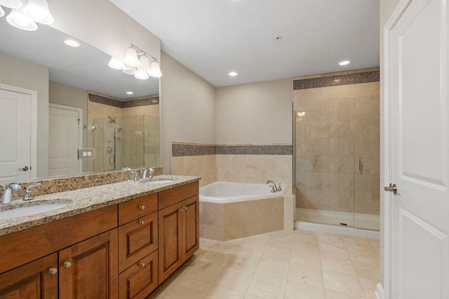1000 Village Center Dr Unit 103, Burr Ridge, IL 60527 - full bath featuring a shower stall, a garden tub, double vanity, tile patterned floors, and recessed lighting