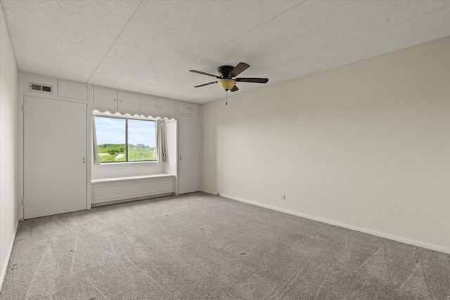 920 Vose Dr Unit 612, Gurnee, IL 60031 - carpeted spare room featuring a ceiling fan and a textured ceiling