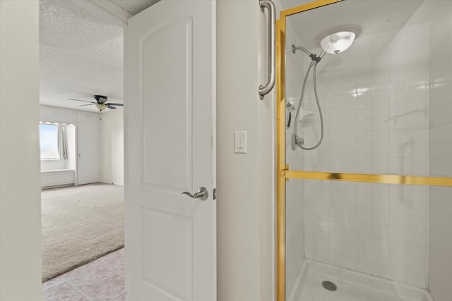 920 Vose Dr Unit 612, Gurnee, IL 60031 - full bathroom with a textured ceiling, a tile shower, ceiling fan, and tile patterned flooring