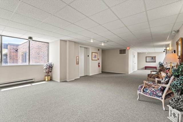 920 Vose Dr Unit 612, Gurnee, IL 60031 - sitting room featuring baseboard heating, carpet flooring, and a paneled ceiling