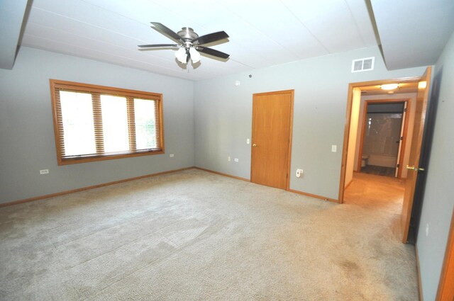 11535 Settlers Pond Way Unit 1C, Orland Park, IL 60467 - unfurnished bedroom with light colored carpet and ceiling fan