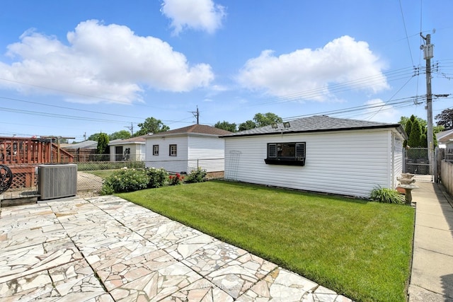 3219 N Pioneer Ave, Chicago, IL 60634 - back of house featuring a patio, a fenced backyard, and roof with shingles