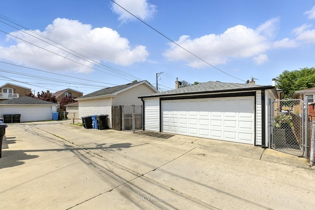 3219 N Pioneer Ave, Chicago, IL 60634 - detached garage featuring a gate